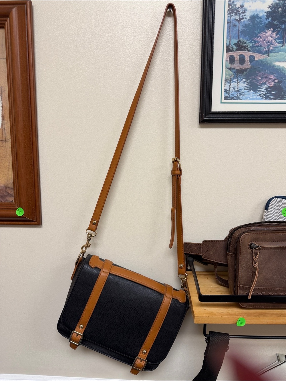 Woman’s Black and Tan Leather Crossbody Bag